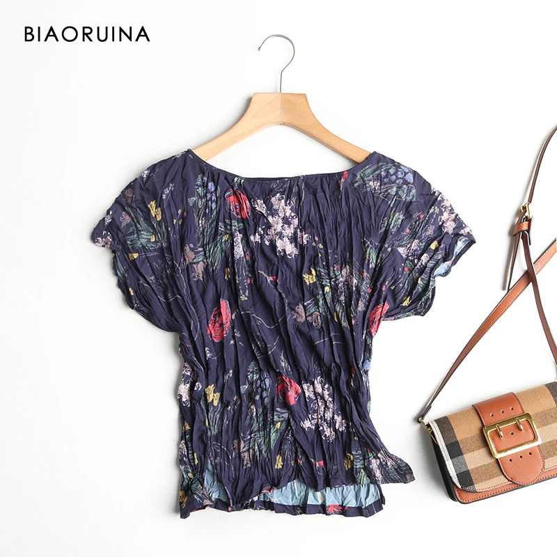 BIAORUINA 6 Colors Women's Loose Floral Print Casual Pleated Shirt Short Sleeve Female Fashion Boat Collar Summer Blouse Tops
BIAORUINA 6 Colors Women's Loose Floral Print Casual Pleated Shirt Short Sleeve Female Fashion Boat Collar Summer Blouse Tops
