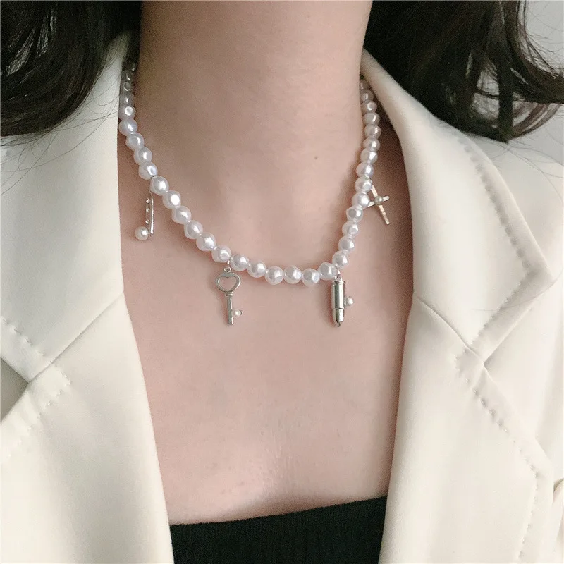 Ins Style Exaggerated Pearl Bead Bullet Cross Pendant Short Clavicle Chain Necklace Black Japanese and Korean Star 
Ins Style Exaggerated Pearl Bead Bullet Cross Pendant Short Clavicle Chain Necklace Black Japanese and Korean Star