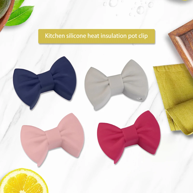 2Pcs Bowknot Silicone Heat Insulation Pot Clip Heat Resistant Non Slip Pot Holder Creative Kitchen Cooking Baking Gadgets
2Pcs Bowknot Silicone Heat Insulation Pot Clip Heat Resistant Non Slip Pot Holder Creative Kitchen Cooking Baking Gadgets