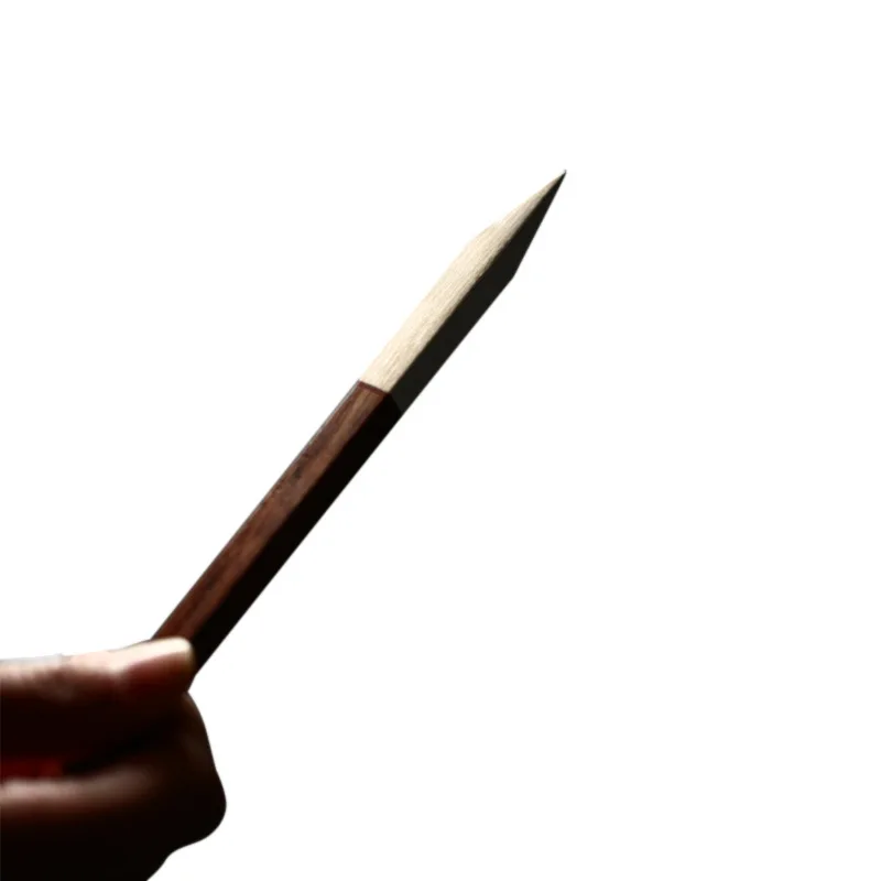 Pu'er tea knife ebony rosewood handmade alloy black tea knife stainless steel tea needle tea cone accessories
Pu'er tea knife ebony rosewood handmade alloy black tea knife stainless steel tea needle tea cone accessories