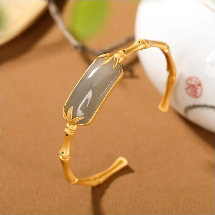 Ancient gold craftsmanship natural Hetian jade soot bamboo leaf bracelet retro light luxury exquisite ladies silver jewelry
Ancient gold craftsmanship natural Hetian jade soot bamboo leaf bracelet retro light luxury exquisite ladies silver jewelry
