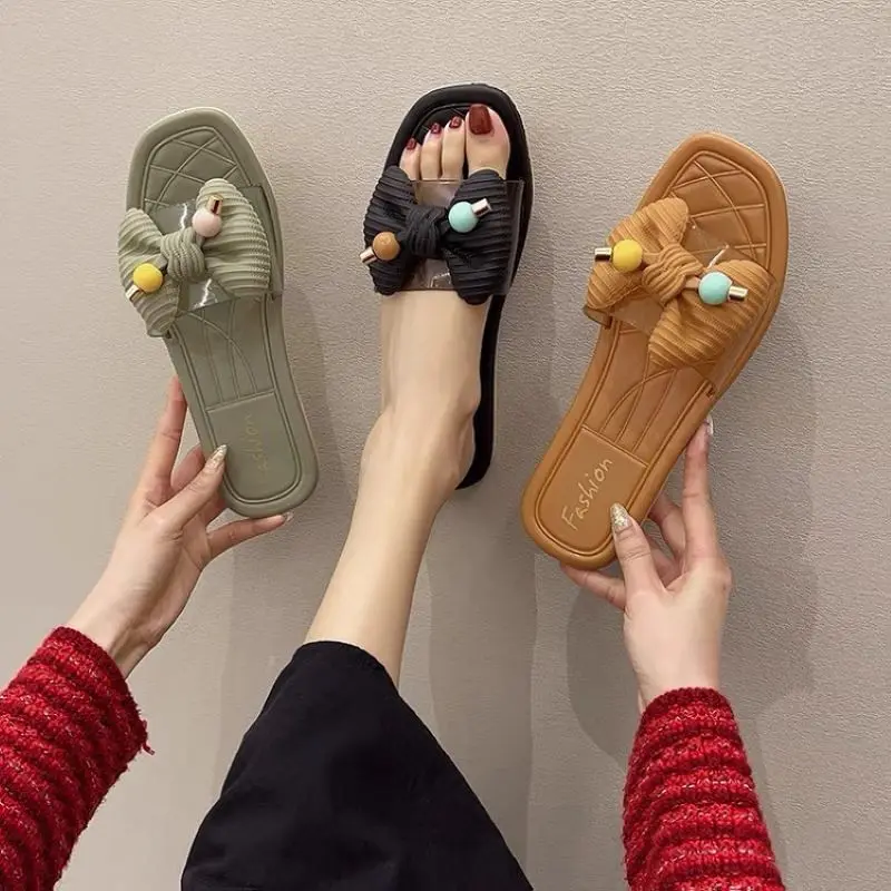 Women Sandals Summer Bow Buckle Transparent Flat Sandals Outdoor fashion Female Beach Brand Designer Slides
Women Sandals Summer Bow Buckle Transparent Flat Sandals Outdoor fashion Female Beach Brand Designer Slides