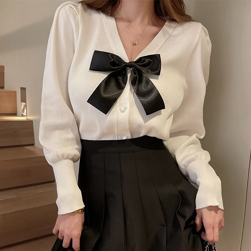Korean Chic Bow Tie Cardigan Women Spring Autumn Long Puff Sleeve Knitted Sweater Elegant Cute Sexy Tops pull femme
Korean Chic Bow Tie Cardigan Women Spring Autumn Long Puff Sleeve Knitted Sweater Elegant Cute Sexy Tops pull femme