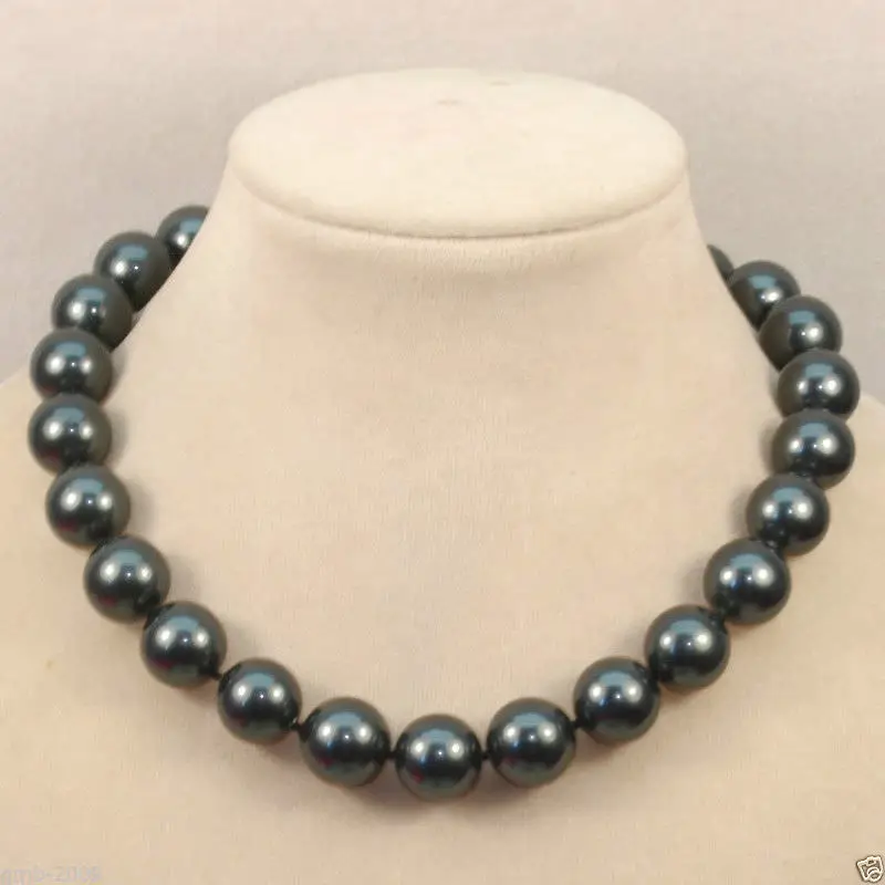 stunning 12-11 mm freshwater black green round pearl necklace 18 inch 14 k gold
stunning 12-11 mm freshwater black green round pearl necklace 18 inch 14 k gold