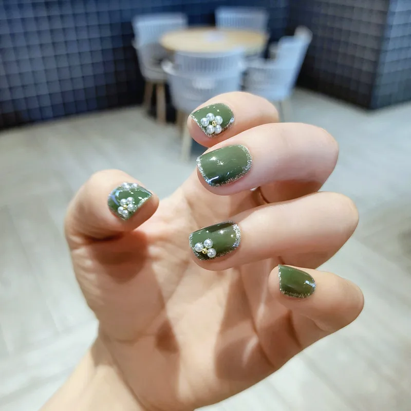 Fake Nails Green Phnom Penh Short Pearl Flower Wearing Nail Sticker Finished Nail Sticker 24 Nail Sticker With Glue STTX889
Fake Nails Green Phnom Penh Short Pearl Flower Wearing Nail Sticker Finished Nail Sticker 24 Nail Sticker With Glue STTX889