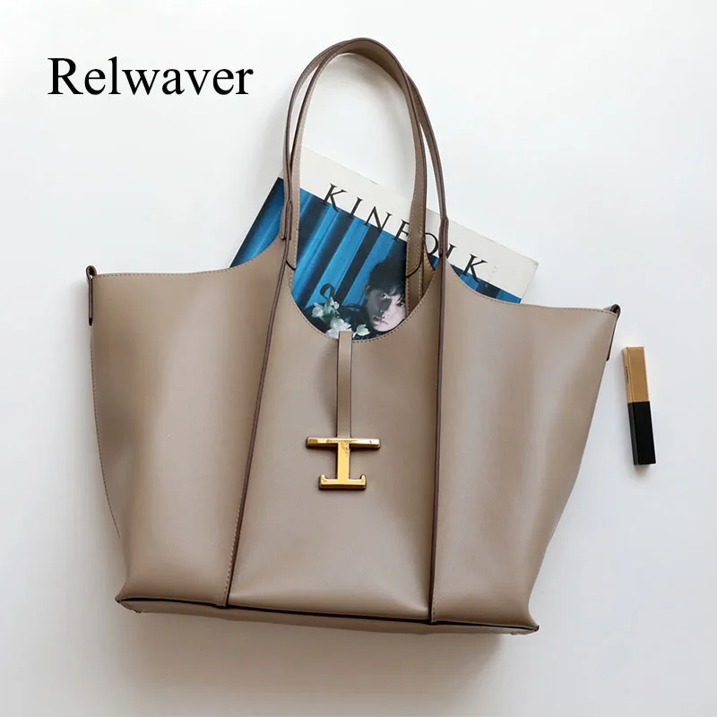 Cowhide commuting bag leisure shopping bag big capacity women handbag letter lock shoulder bag casual women tote bag 
Cowhide commuting bag leisure shopping bag big capacity women handbag letter lock shoulder bag casual women tote bag