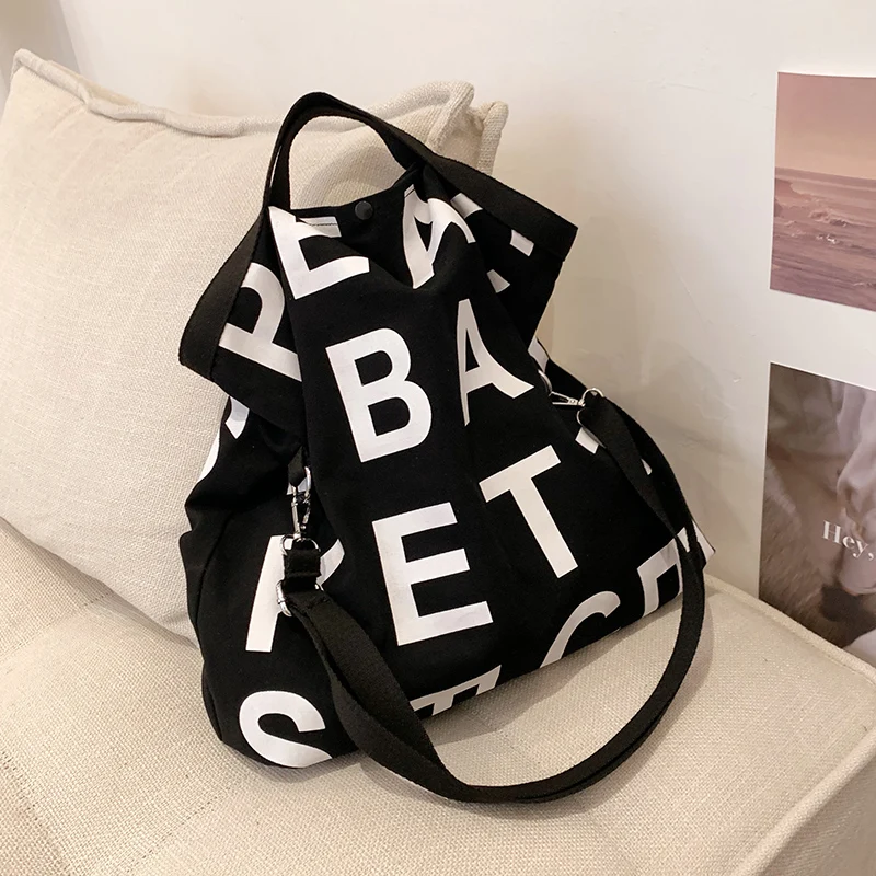 Вместительная холщовая большая сумка через плечо для женщин 2021 летние модные повседневные кошельки дорожные сумки
Вместительная холщовая большая сумка через плечо для женщин 2021 летние модные повседневные кошельки дорожные сумки