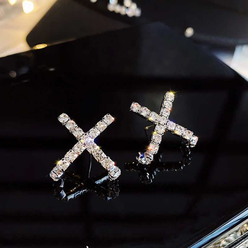 2020 new design feeling arc X letter modeling Earrings Fashion Korean women's jewelry party light luxury simple Stud Earrings
2020 new design feeling arc X letter modeling Earrings Fashion Korean women's jewelry party light luxury simple Stud Earrings