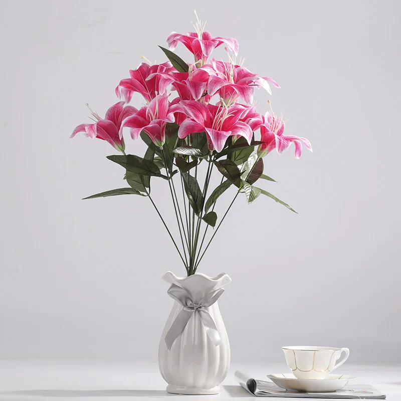 1 bouquet 12 head artificial flowers perfume lily for DIY living room home garden wedding decoration
1 bouquet 12 head artificial flowers perfume lily for DIY living room home garden wedding decoration