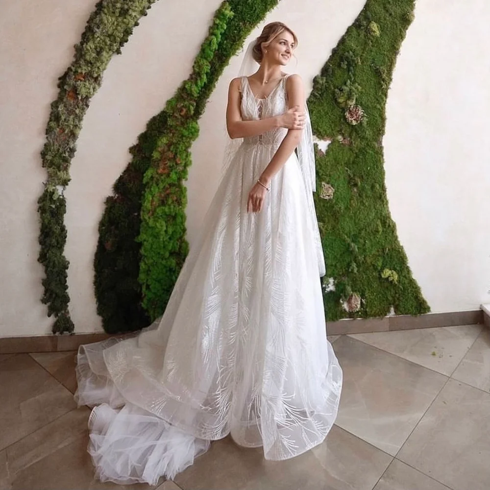 Wedding Dress A-Line V-Neck Lace Appliques Sequined Tulle Backless Sleeveless Floor Length Sweep Train Bride Gown Custom Made
Wedding Dress A-Line V-Neck Lace Appliques Sequined Tulle Backless Sleeveless Floor Length Sweep Train Bride Gown Custom Made