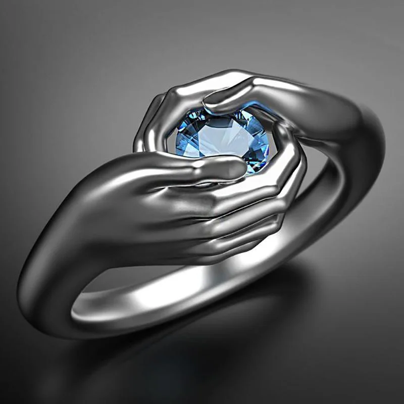 New Fashion Creative Design Simulation Hands Holding Blue Zircon Metal Rings for Men Women Personality Charm Party Prom Jewelry
New Fashion Creative Design Simulation Hands Holding Blue Zircon Metal Rings for Men Women Personality Charm Party Prom Jewelry
