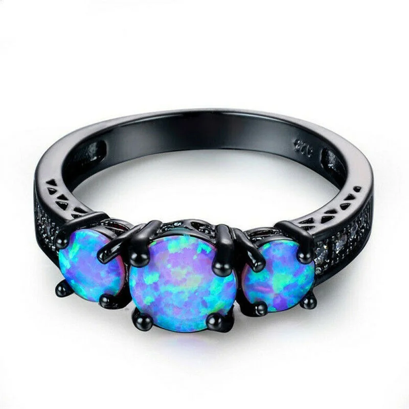 Винтажное обручальное кольцо с голубым мерцанием и черным золотом размер 6-10 |