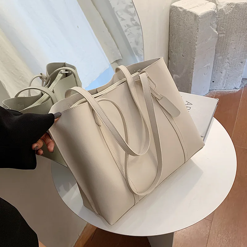 Large capacity female new trendy net red casual tote wild ins one-shoulder portable bucket bag
Large capacity female new trendy net red casual tote wild ins one-shoulder portable bucket bag