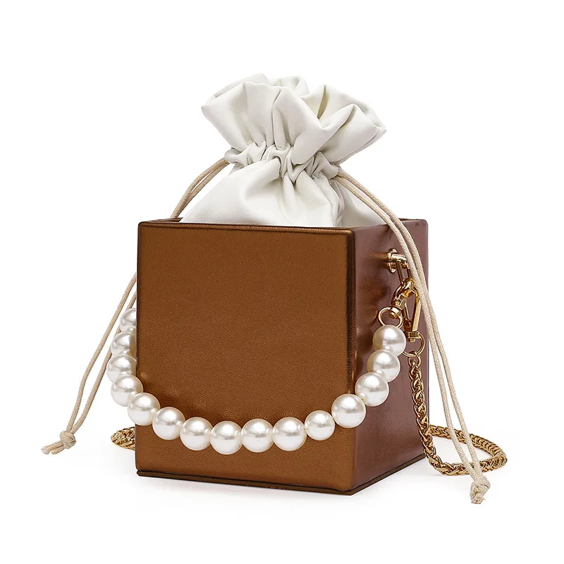 Solid color Box bag Pearl Tote bag 2021 Summer New High-quality PU Leather Women's Designer Handbag Chain Shoulder Messenger Bag
Solid color Box bag Pearl Tote bag 2021 Summer New High-quality PU Leather Women's Designer Handbag Chain Shoulder Messenger Bag