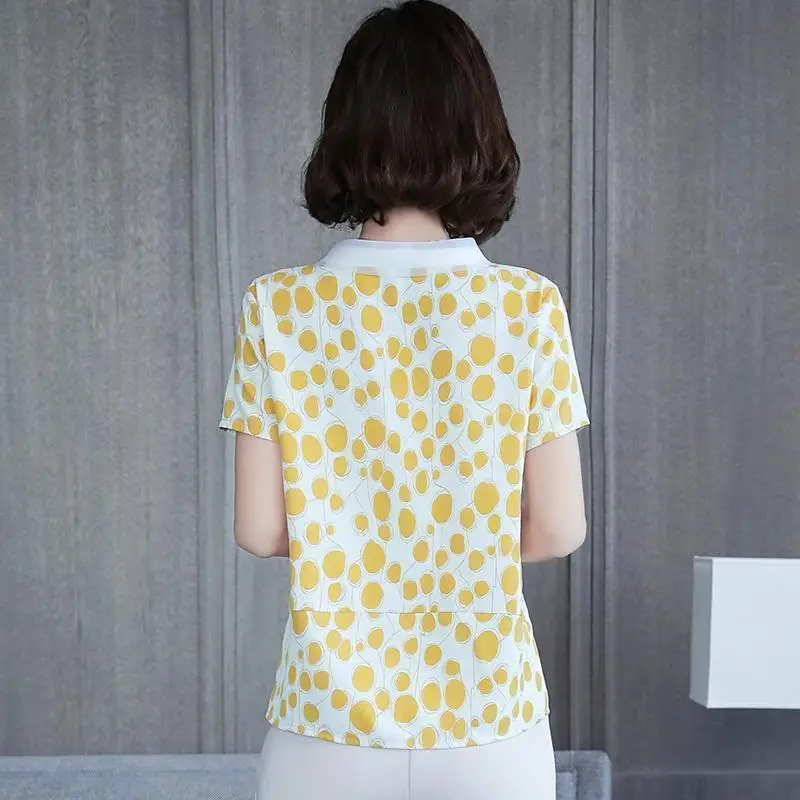 Polka Dot Printed Short-sleeved Chiffon Shirt Female Fashion Loose Peter Pan Collar Simple Commuting Stitching Blouse Women 2020
Polka Dot Printed Short-sleeved Chiffon Shirt Female Fashion Loose Peter Pan Collar Simple Commuting Stitching Blouse Women 2020