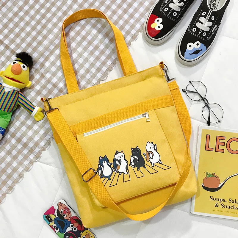Multi-color Fashion Cartoon Canvas Woman Bag Multi-functional College Style Simple Messenger Bag One-shoulder Portable Tote Bag
Multi-color Fashion Cartoon Canvas Woman Bag Multi-functional College Style Simple Messenger Bag One-shoulder Portable Tote Bag
