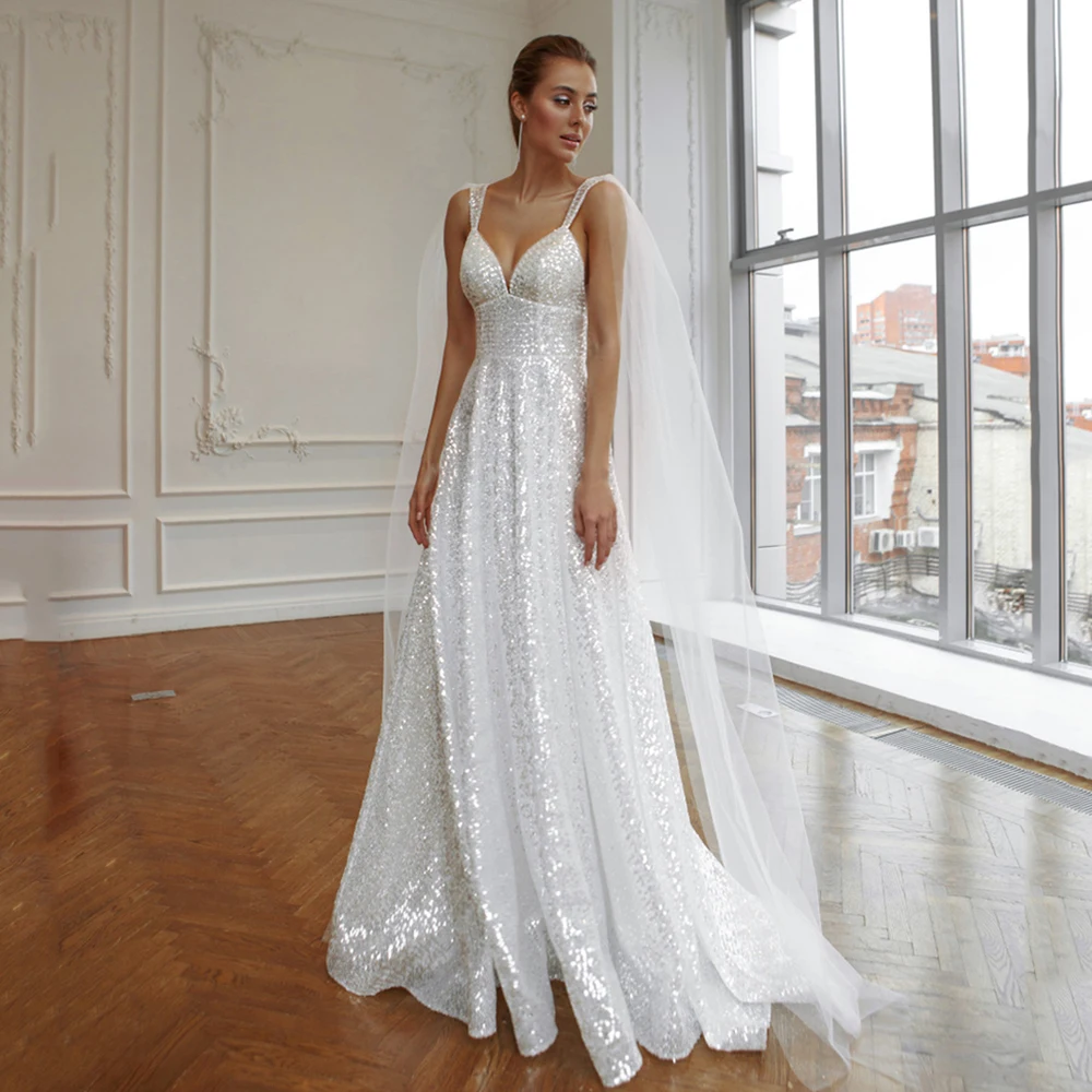 Sweetheart Sequined Wedding Dresses Sleeveless Spaghetti Straps Backless Beading Draped Bridal Gowns 2021 Vestidos De Noivas
Sweetheart Sequined Wedding Dresses Sleeveless Spaghetti Straps Backless Beading Draped Bridal Gowns 2021 Vestidos De Noivas