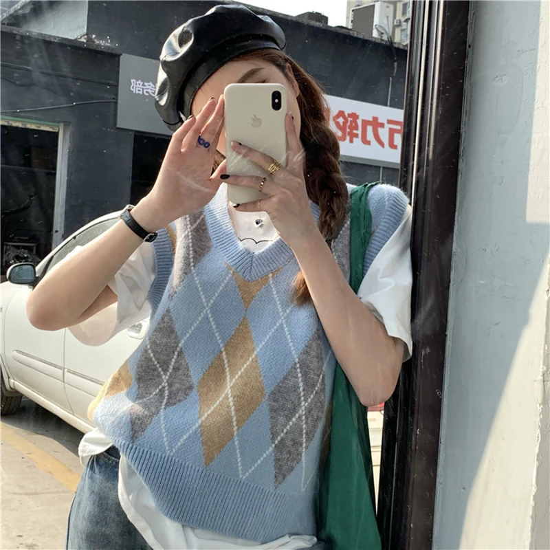 Vintage Sweaters Women V Neck Sleeveless Loose Sweater Vest For Women 2021 Spring Autumn Korean Elegant Pullovers Female CX2075
Vintage Sweaters Women V Neck Sleeveless Loose Sweater Vest For Women 2021 Spring Autumn Korean Elegant Pullovers Female CX2075
