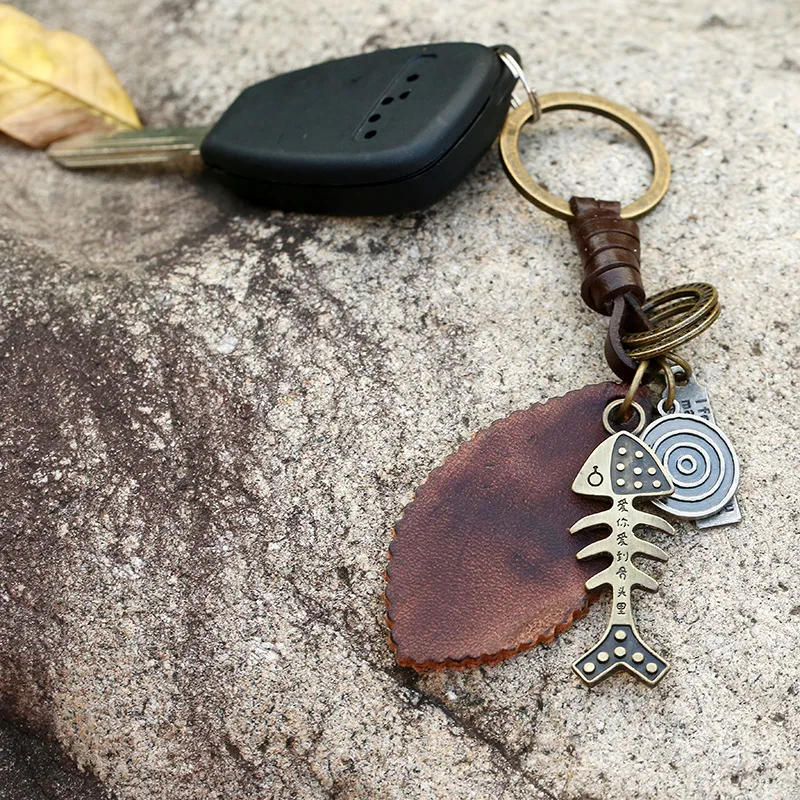 WANGAIYAO new creative keychain gifts for men and women, alloy fish bones, retro woven cowhide keychain, leather pendant
WANGAIYAO new creative keychain gifts for men and women, alloy fish bones, retro woven cowhide keychain, leather pendant