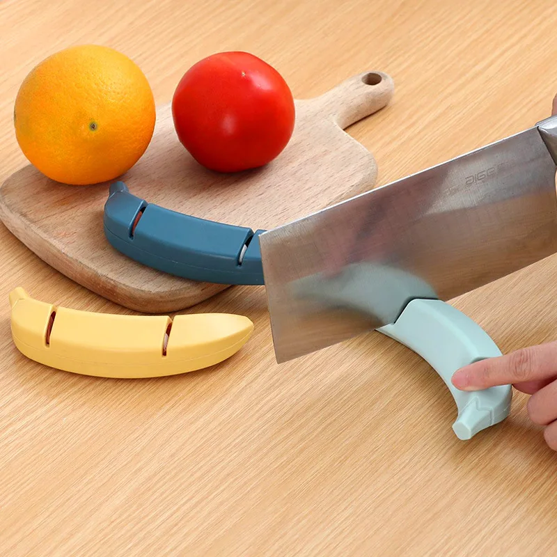 Banana Shape Sharpener Double Mouth Two-stage Quick Whetstone Non-slip Household Kitchen Knife Whetstone Kitchen Tool
Banana Shape Sharpener Double Mouth Two-stage Quick Whetstone Non-slip Household Kitchen Knife Whetstone Kitchen Tool