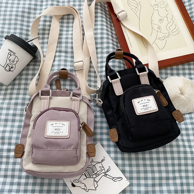 Crossbody bag female mini mobile phone bag 2021 new nylon cloth single shoulder ins fashion color matching small bag tide
Crossbody bag female mini mobile phone bag 2021 new nylon cloth single shoulder ins fashion color matching small bag tide