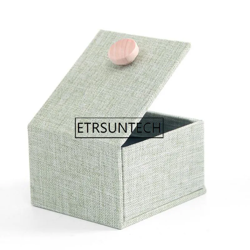 100pcs Simple Linen Wooden Buckle Jewelry Box for Storing Ring Earrings Packaging Box Easy To Carry Gift Box
100pcs Simple Linen Wooden Buckle Jewelry Box for Storing Ring Earrings Packaging Box Easy To Carry Gift Box
