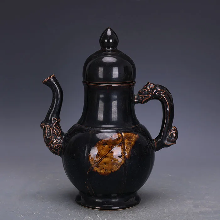 

Song dynasty Jizhou kiln glaze leaf pattern dragon handle elephant trunk ancient porcelain antique collection decoration