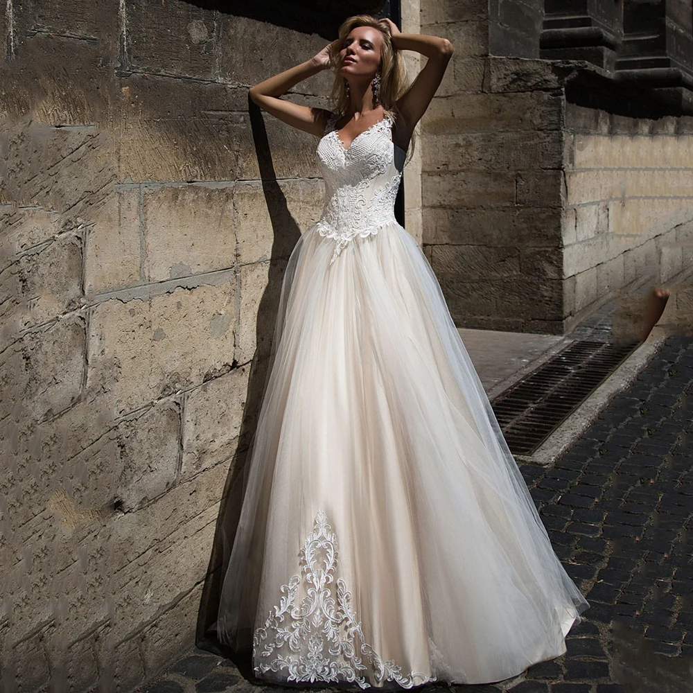 Luxury A-Line Wedding Dresses V-Neck Sleeveless Lace Appliques Lace Up Back Sweep Train Bridal Gowns 2021 Vestidos De Noivas 
Luxury A-Line Wedding Dresses V-Neck Sleeveless Lace Appliques Lace Up Back Sweep Train Bridal Gowns 2021 Vestidos De Noivas