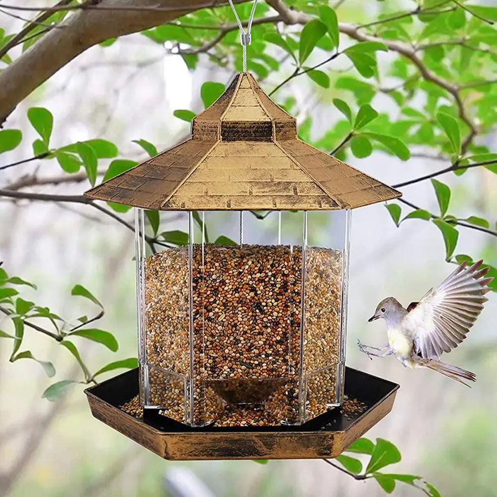 Hanging Wild Bird Seed Feeder Heavy Hexagonal Sealed Bird Feeder Bird House Garden Type Alimentador Feed Adsorption Suction Y2P0
Hanging Wild Bird Seed Feeder Heavy Hexagonal Sealed Bird Feeder Bird House Garden Type Alimentador Feed Adsorption Suction Y2P0