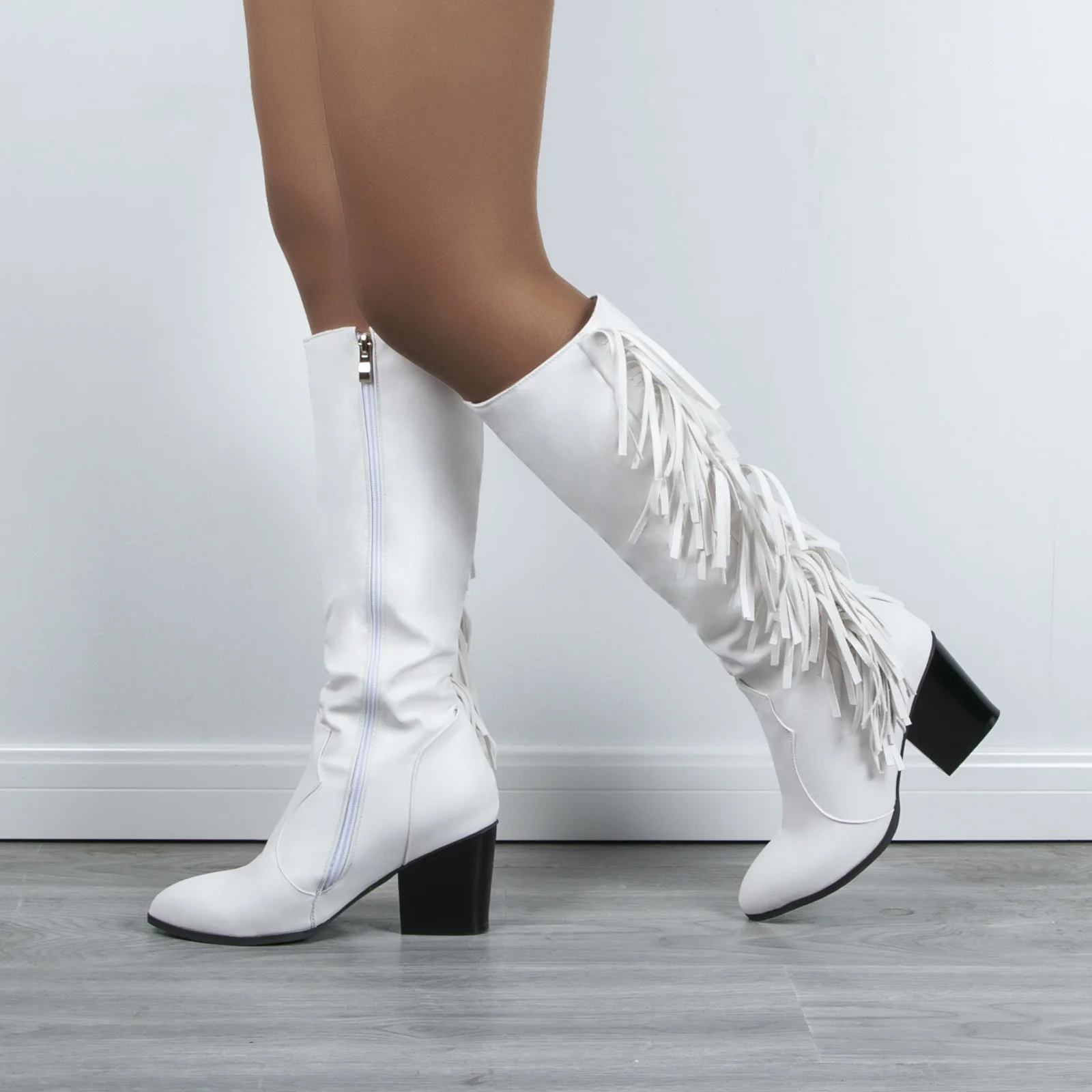 Winter New Ladies Long Tube Tassel Boots European And American Style Pointy Thick Heel Side Zipper Large Size Fashion Boots 
Winter New Ladies Long Tube Tassel Boots European And American Style Pointy Thick Heel Side Zipper Large Size Fashion Boots