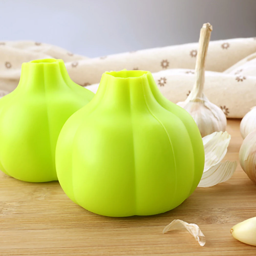 1PC Silicone Garlic Peeler Soft Garlic Peeler Food Grade Silicone Material Peeling Garlic Skin Remover Kitchen Accessories Tools
1PC Silicone Garlic Peeler Soft Garlic Peeler Food Grade Silicone Material Peeling Garlic Skin Remover Kitchen Accessories Tools