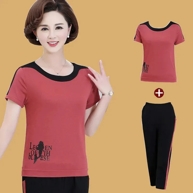 Mom casual plus size tracksuit Fashion Printing short sleeves top+Ankle-Length pant Summer solid cotton Spliced two piece set
Mom casual plus size tracksuit Fashion Printing short sleeves top+Ankle-Length pant Summer solid cotton Spliced two piece set