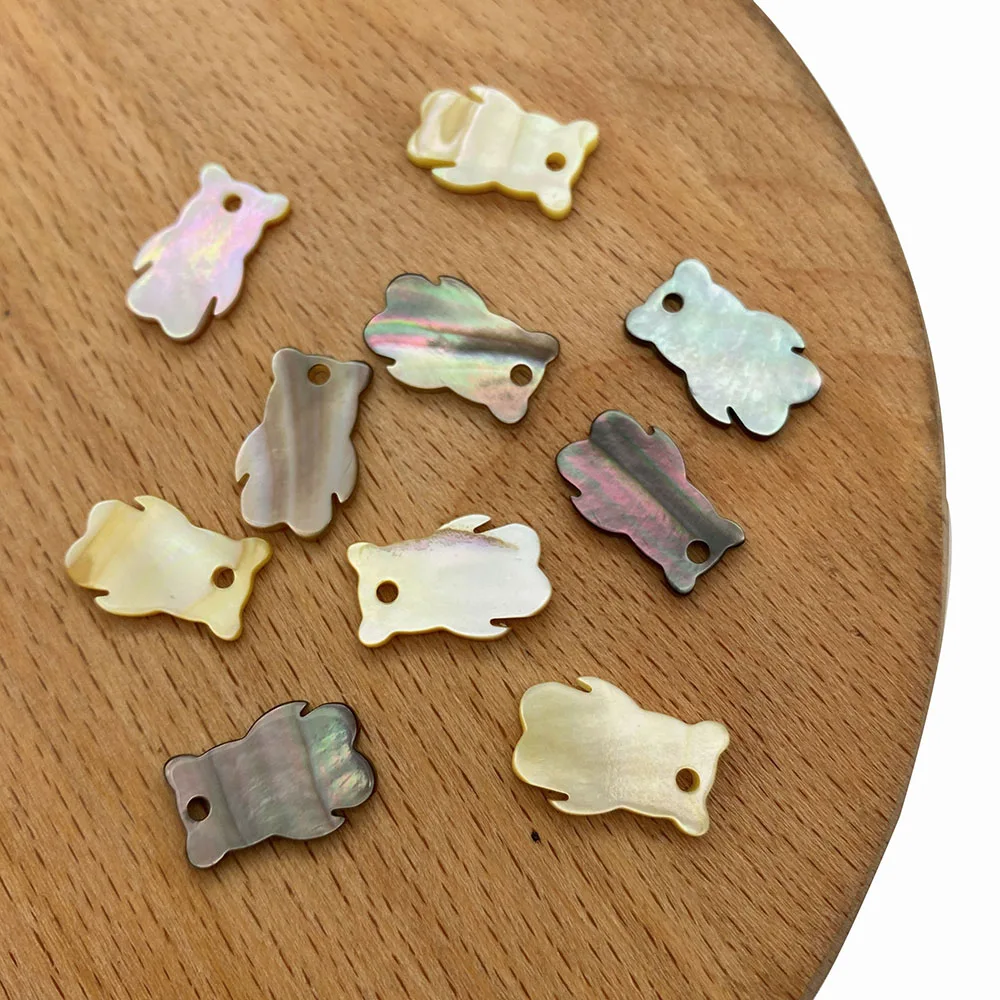 5pcs/pack Bear Shaped Natural Sea Shell Loose Beads Pendant Charms Yellow Color Black 10x15mm DIY for Necklace Bracelet Earrings
5pcs/pack Bear Shaped Natural Sea Shell Loose Beads Pendant Charms Yellow Color Black 10x15mm DIY for Necklace Bracelet Earrings