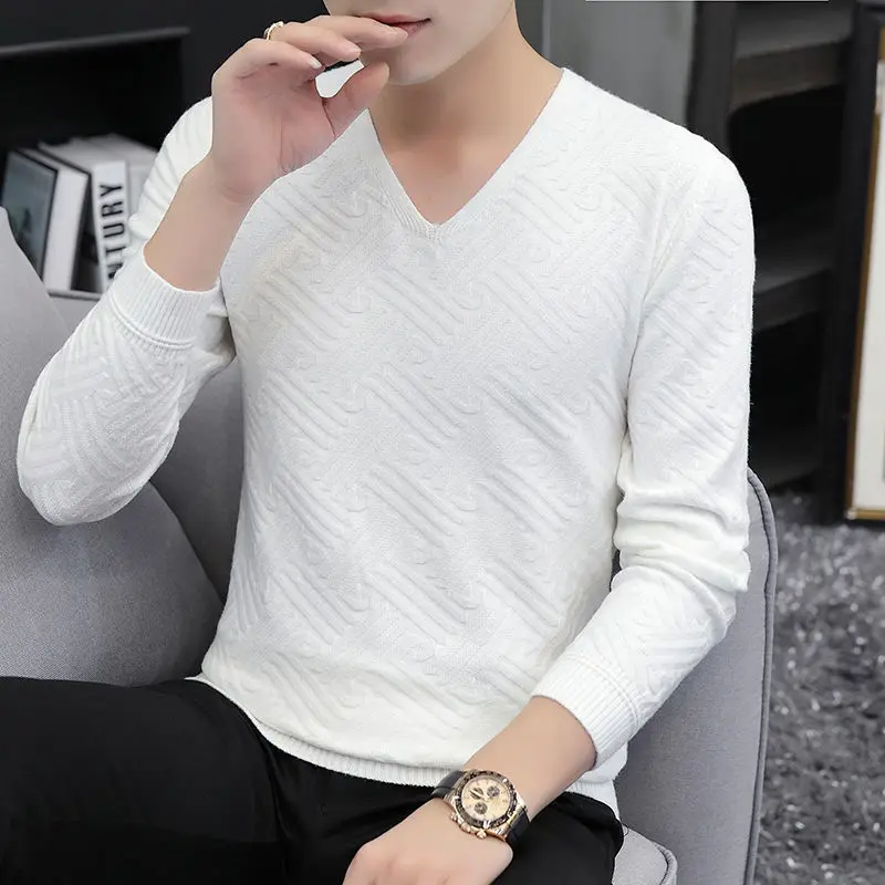 Autumn and winter V-neck sweater men's white long-sleeved knitted bottoming shirt woolen clothes tide
Autumn and winter V-neck sweater men's white long-sleeved knitted bottoming shirt woolen clothes tide