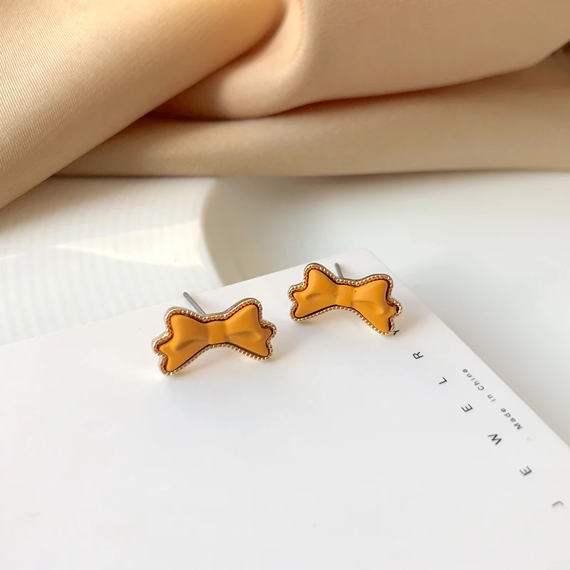 Women Jewelry Bow Earrings Simply Deign Sweet Korean Temperament Hot Selling Yellow Stud Earrings For Party Gifts
Women Jewelry Bow Earrings Simply Deign Sweet Korean Temperament Hot Selling Yellow Stud Earrings For Party Gifts