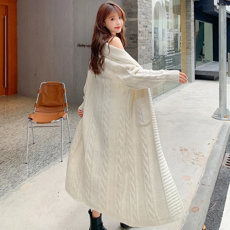 Make new winter sweater female loose big lazy wind super long thickening knitting cardigan coat female temperament
Make new winter sweater female loose big lazy wind super long thickening knitting cardigan coat female temperament