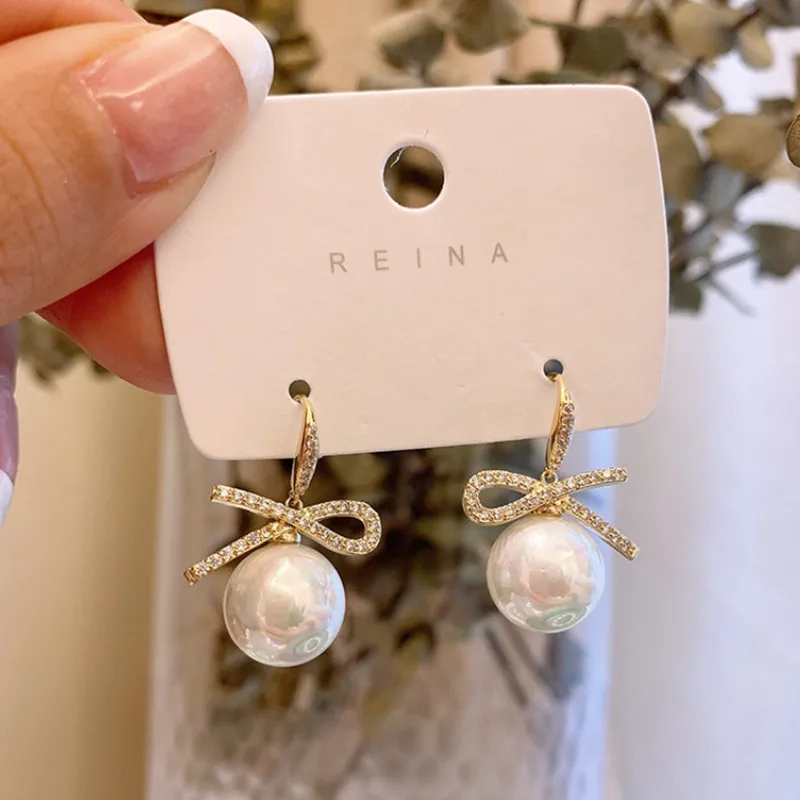 Fashion Simple Romantic Temperament Women's Diamond Bow Pearl Earrings New Women's Earrings Earrings Wholesale
Fashion Simple Romantic Temperament Women's Diamond Bow Pearl Earrings New Women's Earrings Earrings Wholesale
