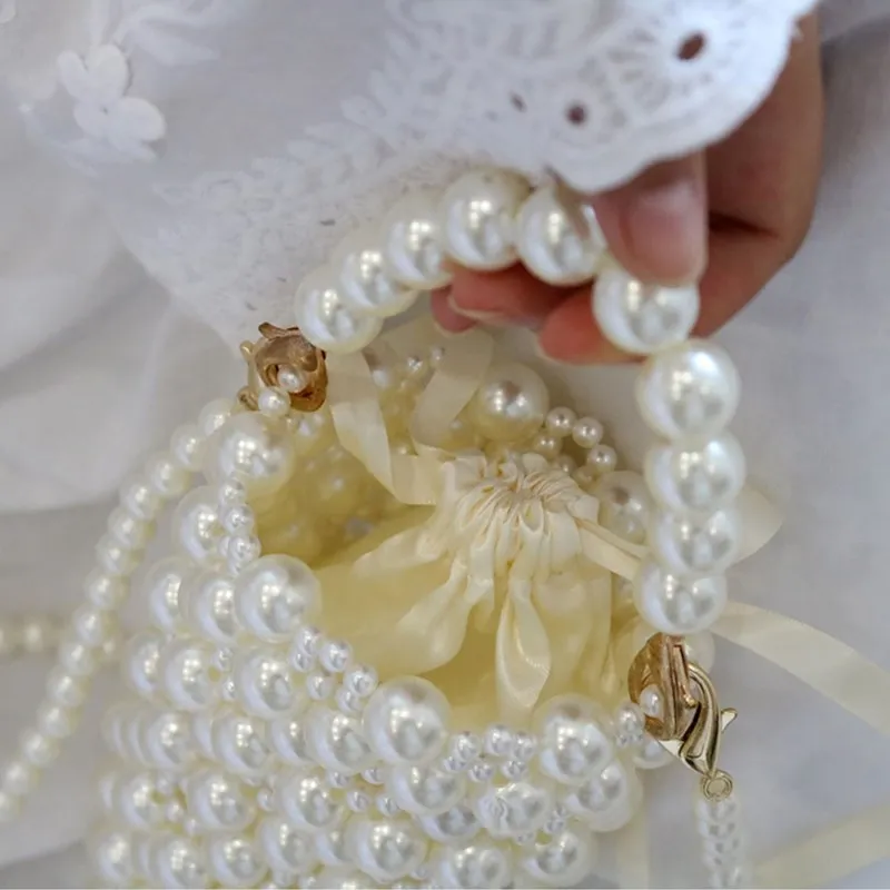 Luxury Fashion Hand-woven Custom Pearl Bucket Bag 2020 Autumn New Female Mobile Phone Bag High Quality Women Purse and Handbags
Luxury Fashion Hand-woven Custom Pearl Bucket Bag 2020 Autumn New Female Mobile Phone Bag High Quality Women Purse and Handbags