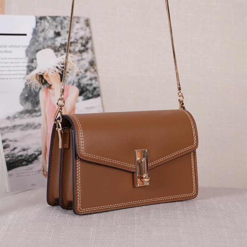 WOONAM Women New Fashion Handbag Genuine Calf Leather Small Chain Shoulder Strap Lock Flap Box Bag GB072428
WOONAM Women New Fashion Handbag Genuine Calf Leather Small Chain Shoulder Strap Lock Flap Box Bag GB072428