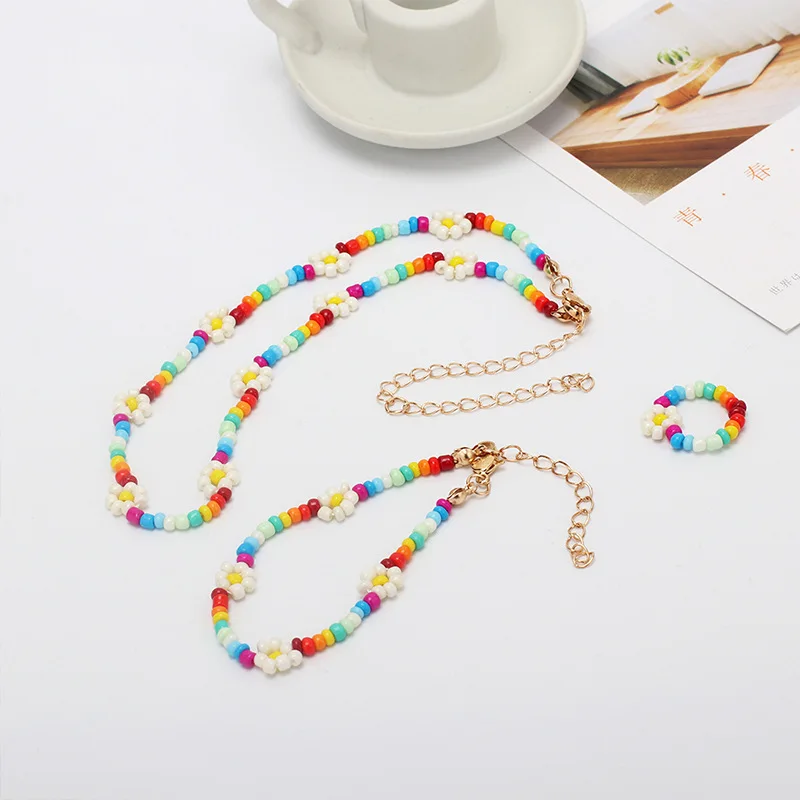 Korean Bead Daisy Necklace Bracelet Finger Ring Set For Women Girls Bohemian Colorful Handmade Clavicle Necklace Jewelry Gift
Korean Bead Daisy Necklace Bracelet Finger Ring Set For Women Girls Bohemian Colorful Handmade Clavicle Necklace Jewelry Gift