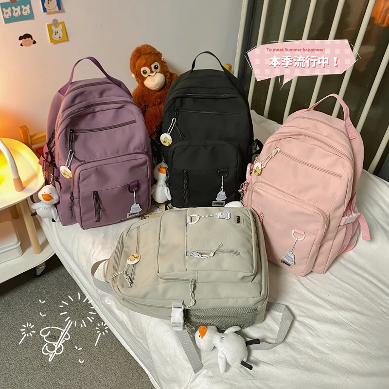 Solid Student Backpack Waterproof Nylon Women Rucksack Female Lovely Travel Bagpack A4 Book School bag For Teenager 
Solid Student Backpack Waterproof Nylon Women Rucksack Female Lovely Travel Bagpack A4 Book School bag For Teenager