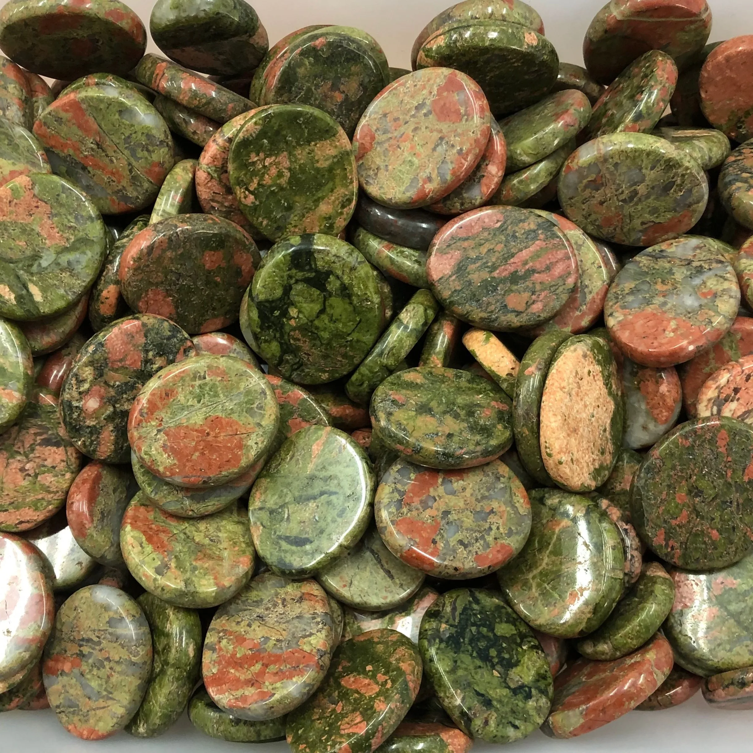 Natural crystal unakite round stone Palm Stone
Natural crystal unakite round stone Palm Stone