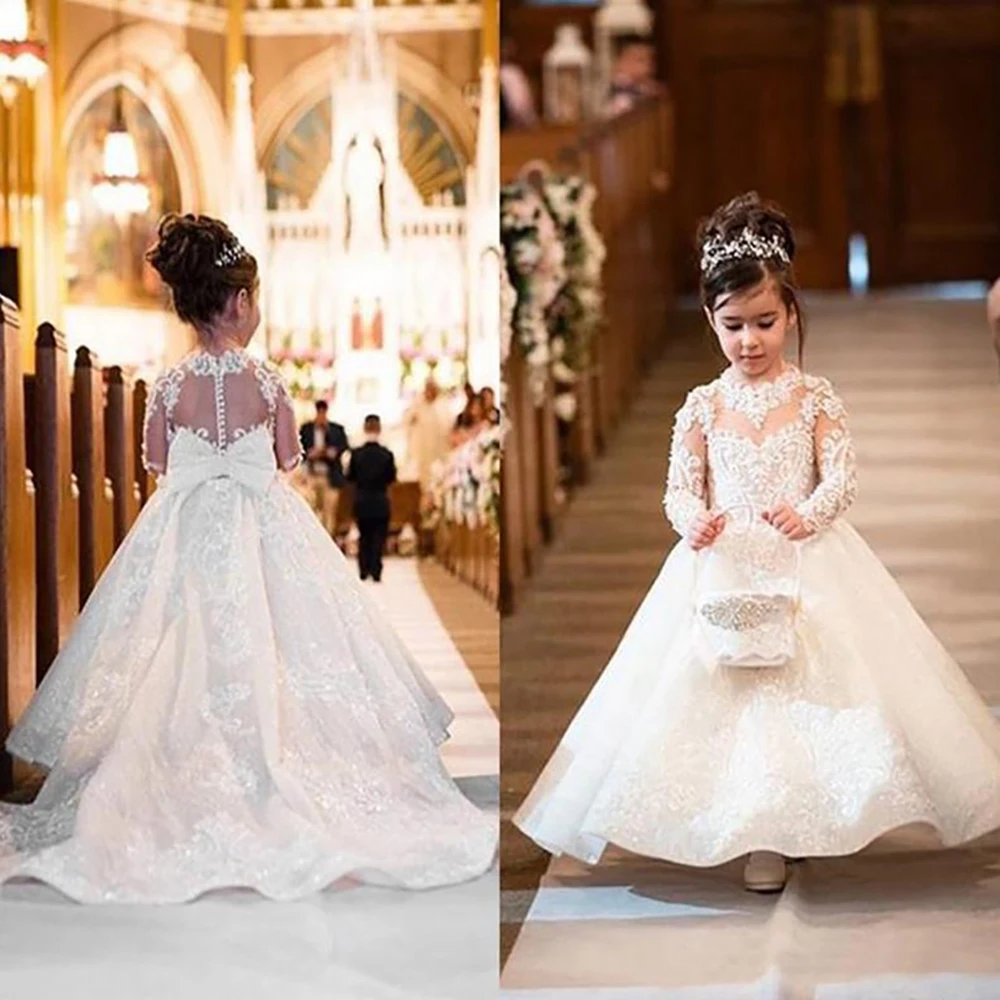 

Lovely Flower Girls Dresses For Weddings Princess Jewel Long Sleeves Lace Appliques Big Bow Sweep Train Little Kids Holy Pageant