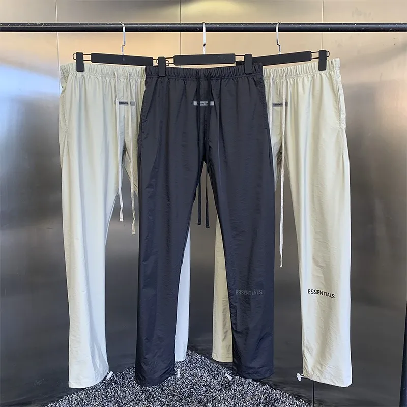 2021 summer new men's casual pants high quality designer brand high street hip hop loose nylon logo reflective sports pants
2021 summer new men's casual pants high quality designer brand high street hip hop loose nylon logo reflective sports pants