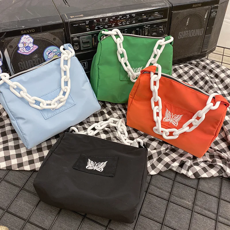 Small fresh contrast color acrylic chain small handbag Japanese lovely armpit bag small square bag girl hand carrying small bag
Small fresh contrast color acrylic chain small handbag Japanese lovely armpit bag small square bag girl hand carrying small bag
