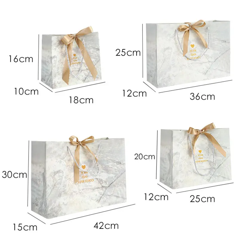 5pcs Paper Gift Tote Bag Marble Pattern Packag Bags Fashion Shopping Bag Wedding Custom Clothing Store Vintage Ribbon Handbag 
5pcs Paper Gift Tote Bag Marble Pattern Packag Bags Fashion Shopping Bag Wedding Custom Clothing Store Vintage Ribbon Handbag