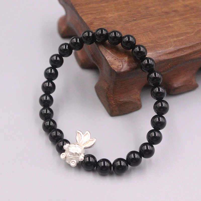 Браслет из серебра S925 пробы с золотыми рыбками и бусинами из черного агата 6 мм
Браслет из серебра S925 пробы с золотыми рыбками и бусинами из черного агата 6 мм