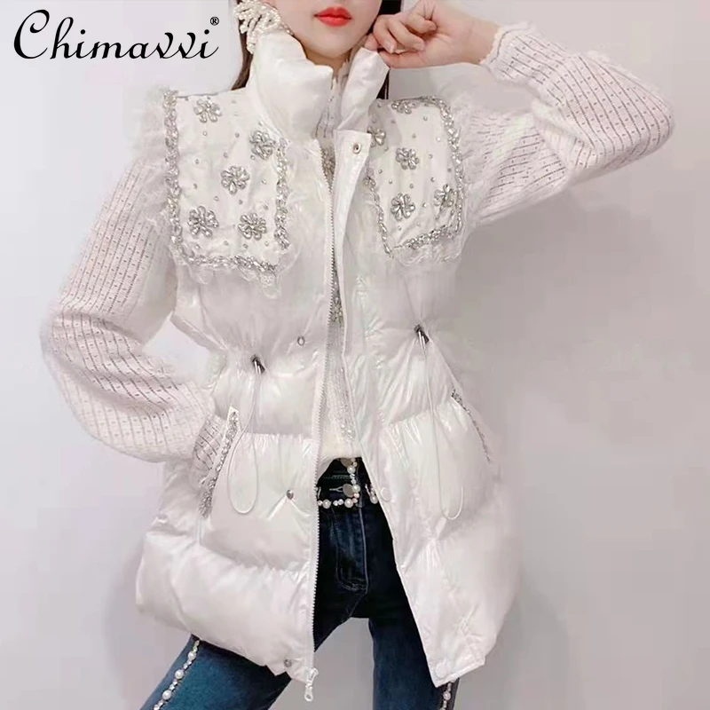 New Female Fashion Sweet Down Cotton Thickened Vest Women's 2021 Winter Korean Style solid color Rhinestone Drawstring Waistcoat
New Female Fashion Sweet Down Cotton Thickened Vest Women's 2021 Winter Korean Style solid color Rhinestone Drawstring Waistcoat