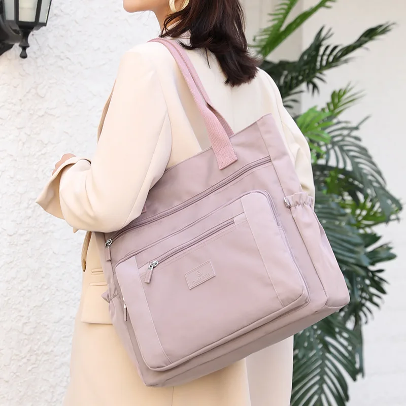 Korean Version 2021 New Fashion Messenger Bag Women Shoulder Bag Nylon Handbag Large Capacity Fashion Women's Tote Shopping Bag
Korean Version 2021 New Fashion Messenger Bag Women Shoulder Bag Nylon Handbag Large Capacity Fashion Women's Tote Shopping Bag