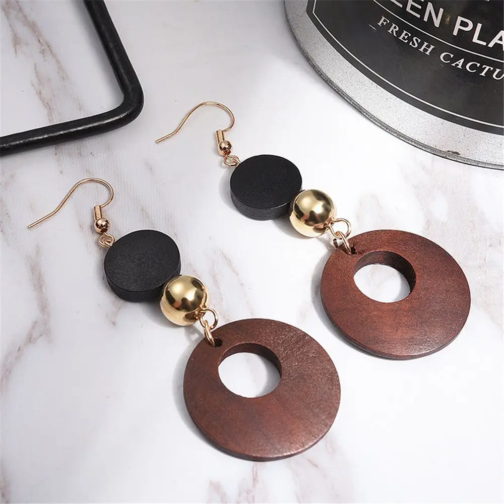 1Pair Simple Fashion Women Geometric Wooden Drop Dangle Earrings Female Hollow Wooden Long Dangle Earrings Wedding Party Gift
1Pair Simple Fashion Women Geometric Wooden Drop Dangle Earrings Female Hollow Wooden Long Dangle Earrings Wedding Party Gift